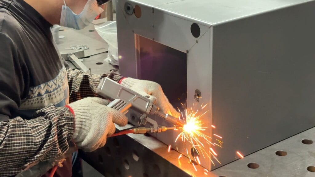 handheld laser welding steel enclosure box bright sparks.jpg