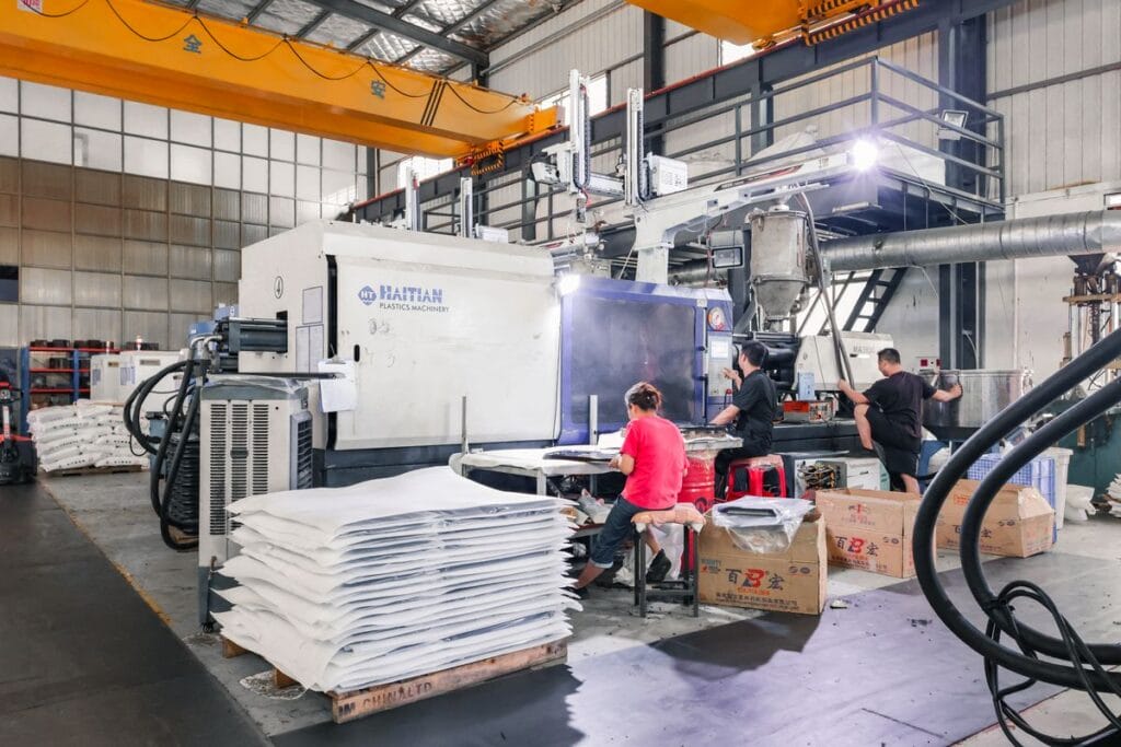 injection molding machine factory workers production