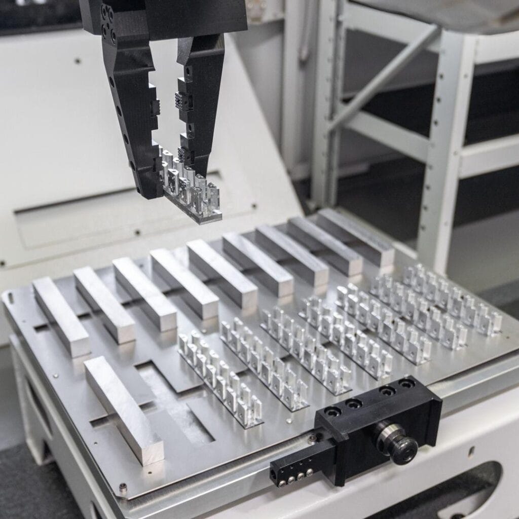 robotic arm sorting cnc machined parts.jpg
