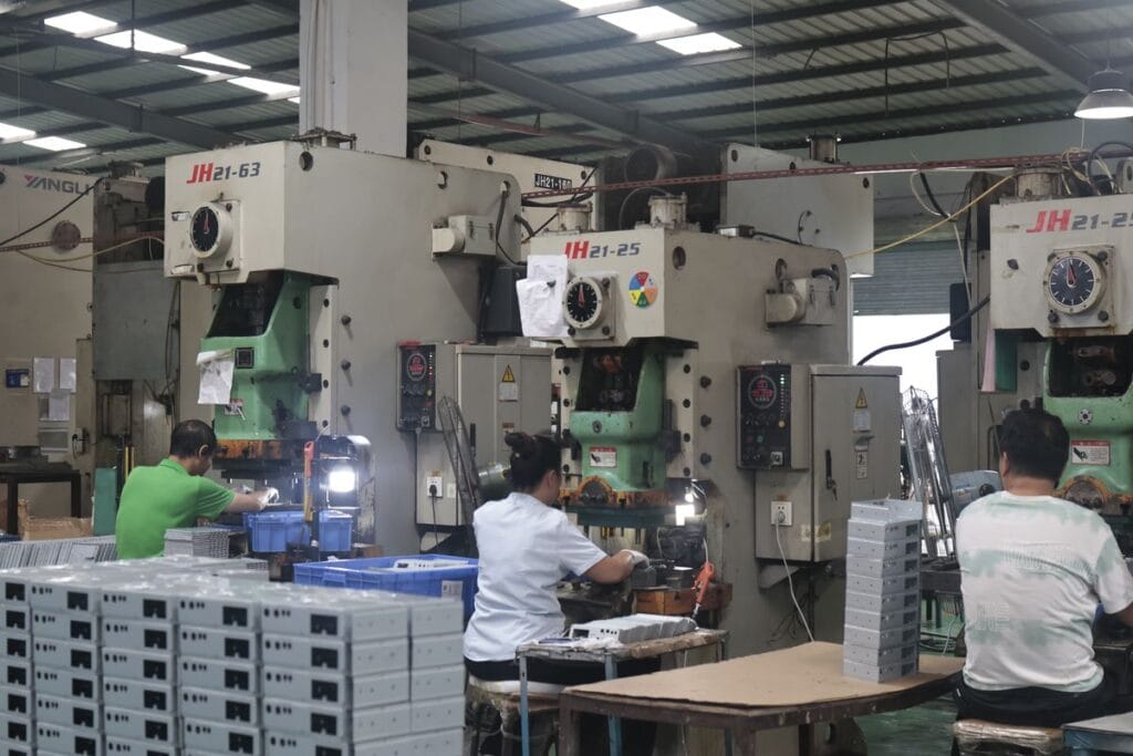 stamping press factory workers sheet metal