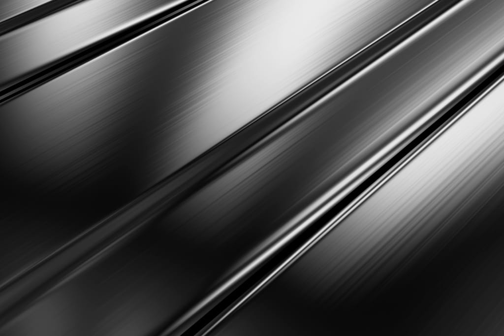 what material and finishing options are available for golf ball markers