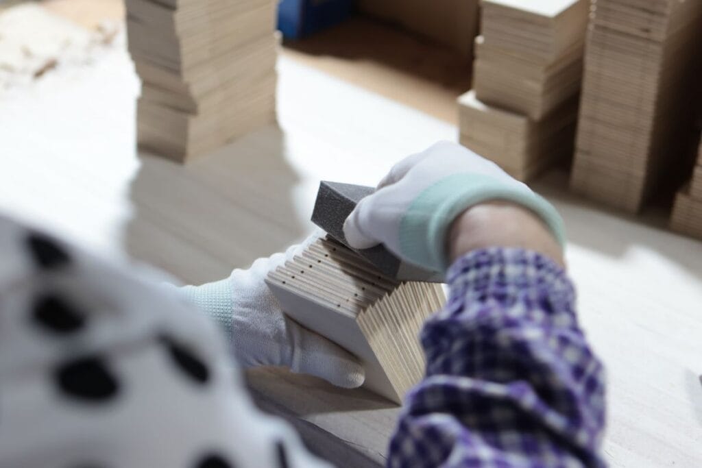 wood panels sanding workshop gloves